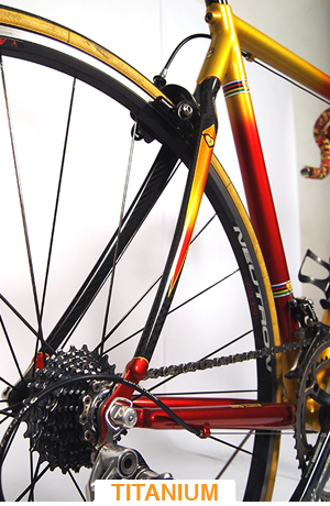 titanium bicycle with yellow and red paint